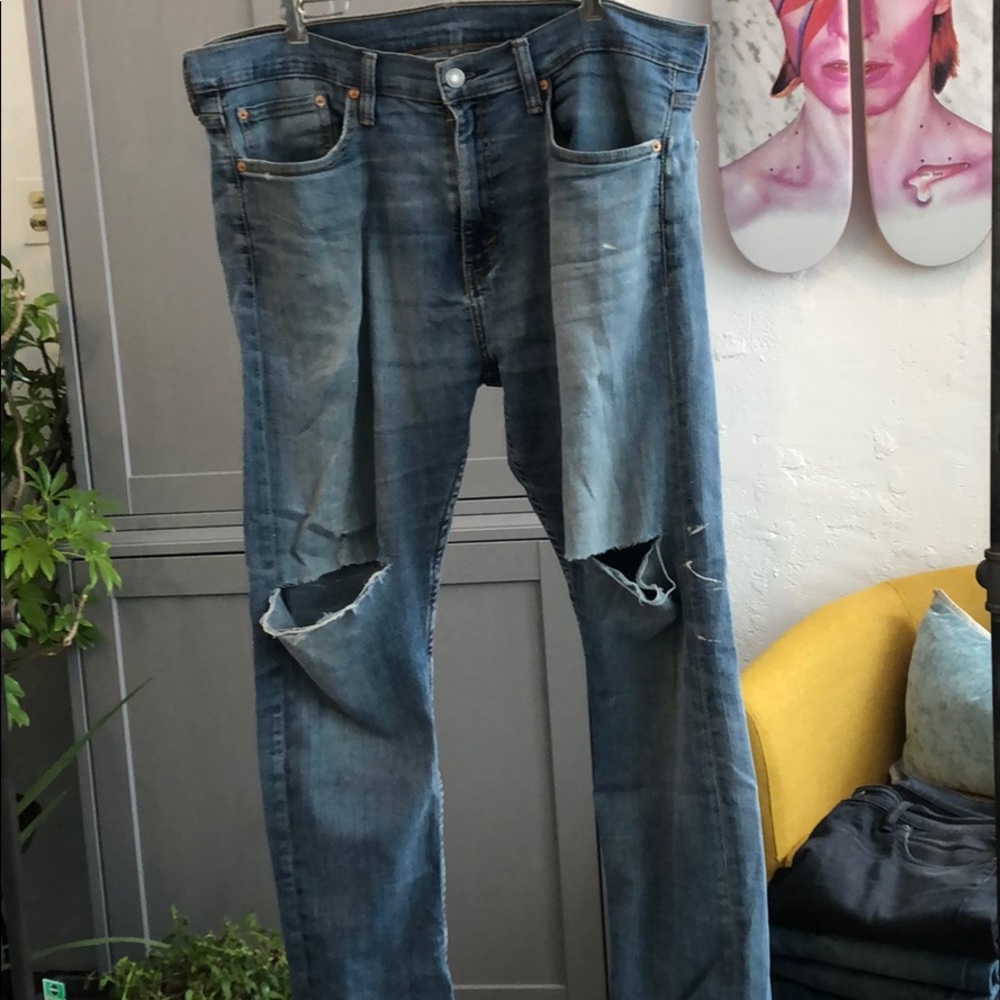 Very well worn Levi’s 510 skinny jeans. 34x30
